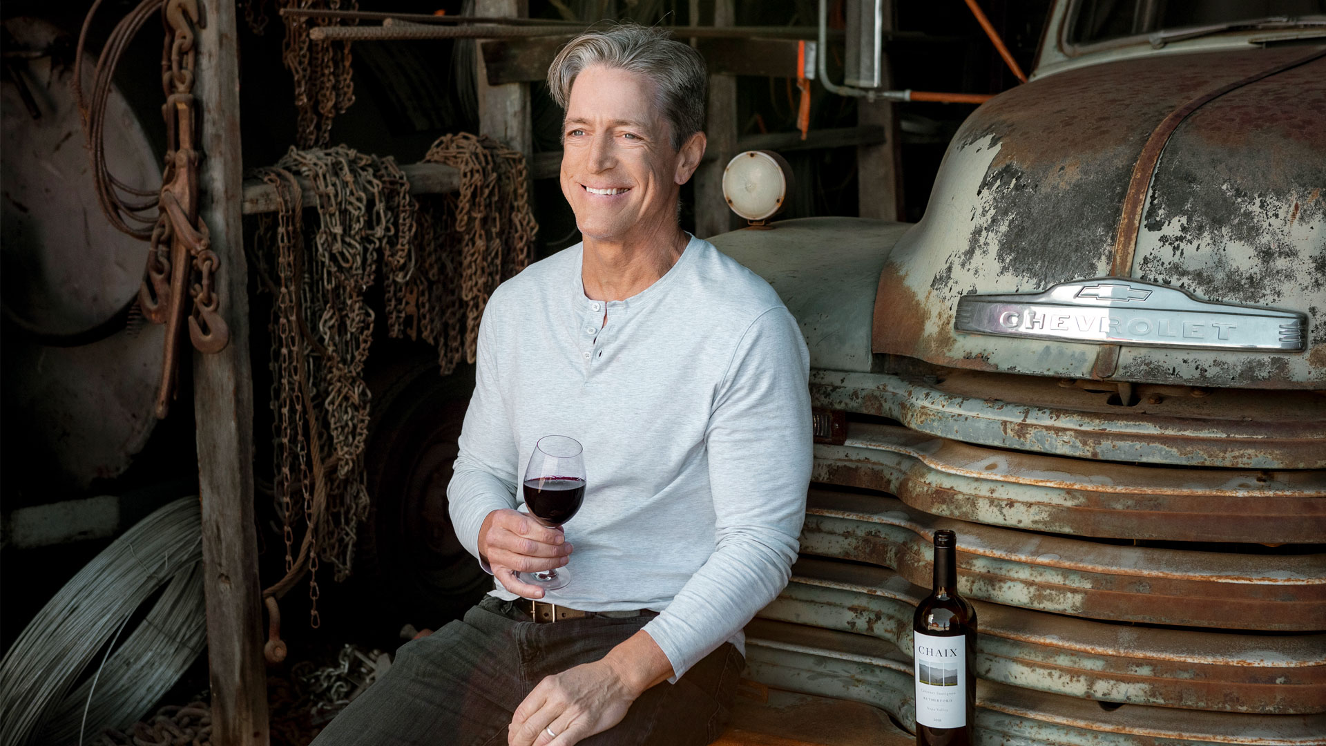 John Chaix Portrait with Cabernet Sauvignon and Old Chevy by Frank Gutierrez